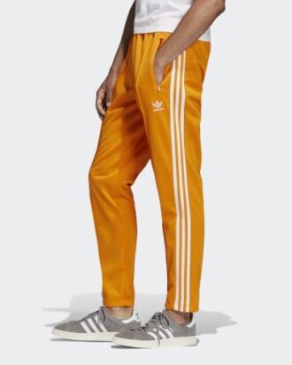 white and orange adidas pants